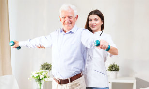 caregiver help senior man for physical therapy